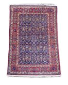 A Tabriz blue ground rug, first half 20th century,woven with palmettes, sarf leaves and