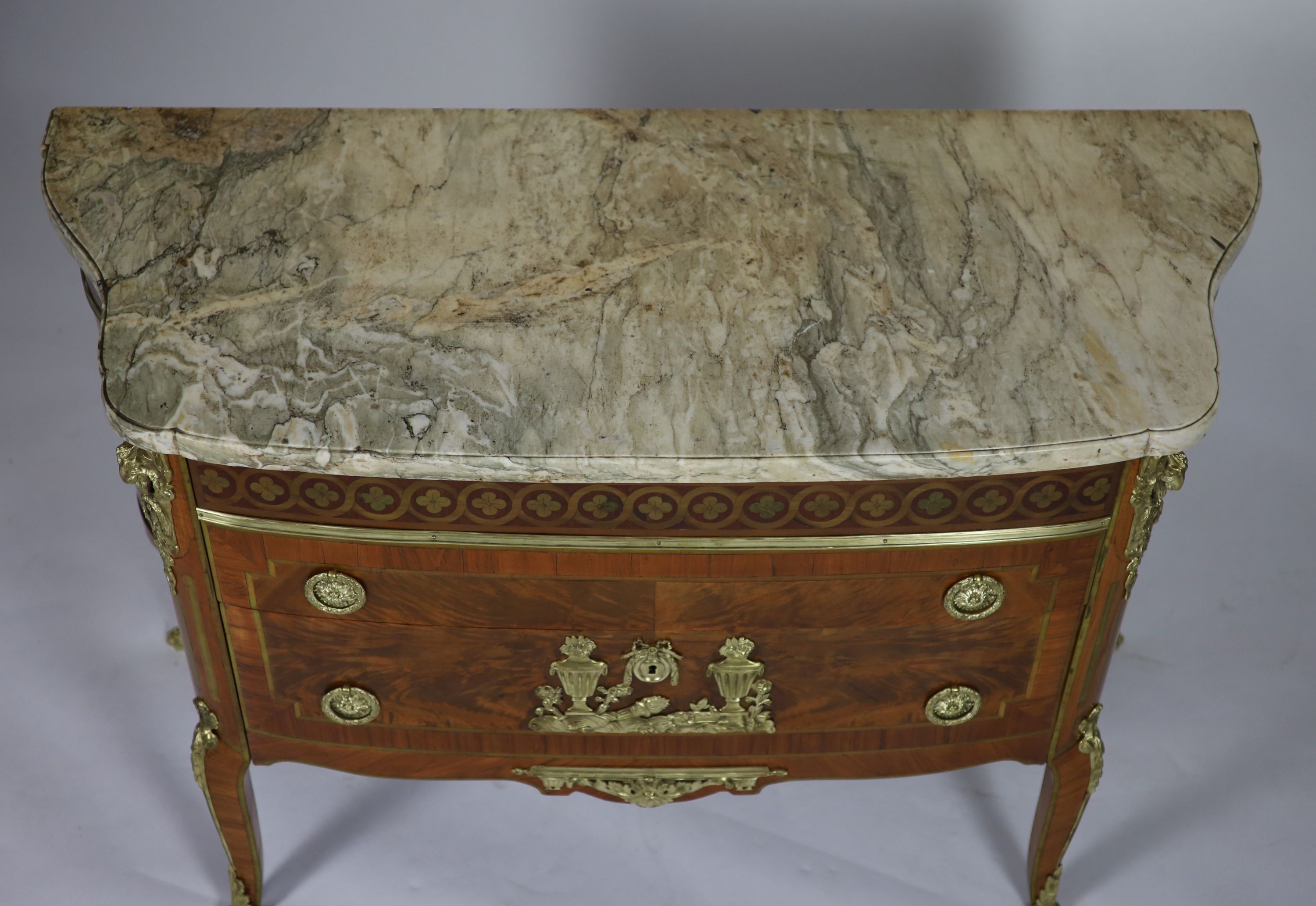 A late 19th century French marquetry and flame mahogany bowfront commodewith variegrated grey marble - Image 4 of 4