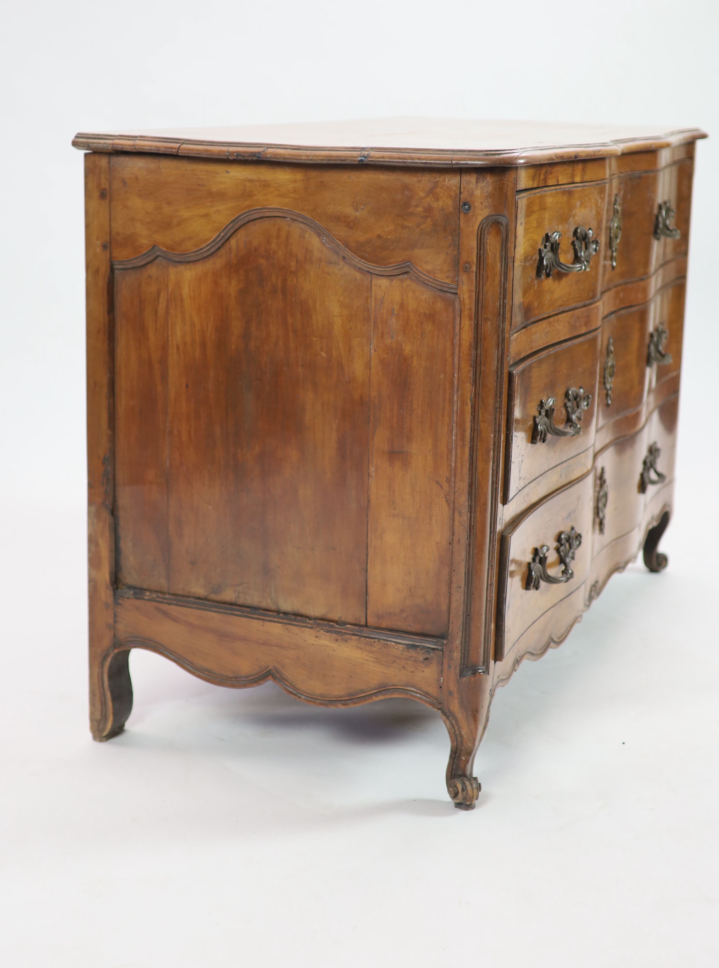 A Louis XV chestnut serpentine chest of three drawers, dated 1776,fitted three long drawers on - Image 4 of 4
