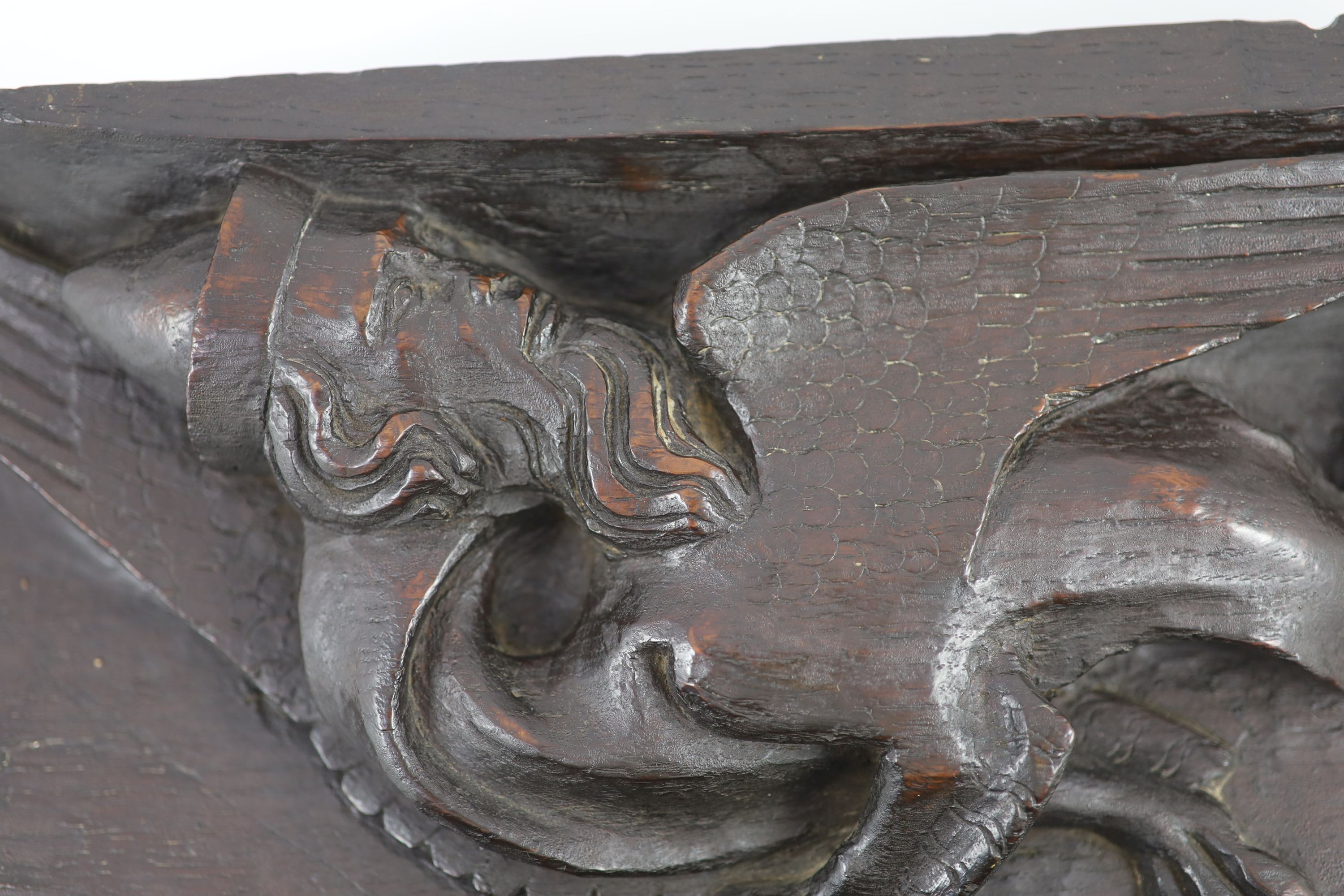 Two carved oak misericord panel fragments, 15th/16th century,the largest carved with as a beast with - Image 2 of 4