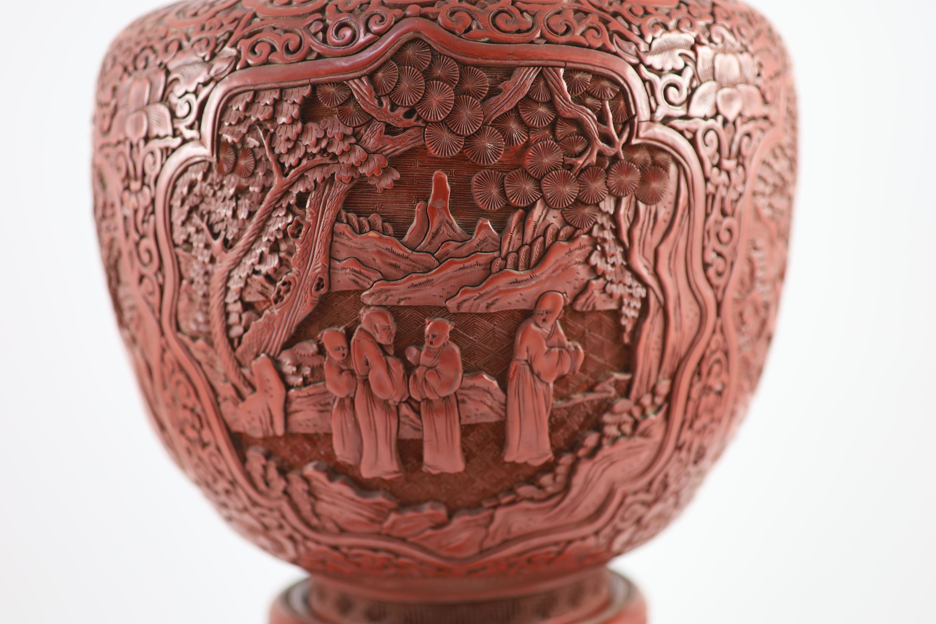 A large Chinese cinnabar lacquer garlic-neck vase and stand, c.1900,carved in high relief with - Image 3 of 4