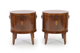 A pair of George III Sheraton style oval inlaid mahogany cellarets,later inlaid, each with oval