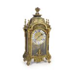 A 19th century French Louis XIV style boullework mantel clockwith urn finial and enamelled tablet