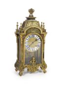 A 19th century French Louis XIV style boullework mantel clockwith urn finial and enamelled tablet