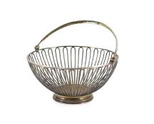 A George III silver wire work circular fruit basket, by Wakelin & Garrard,with engraved rested