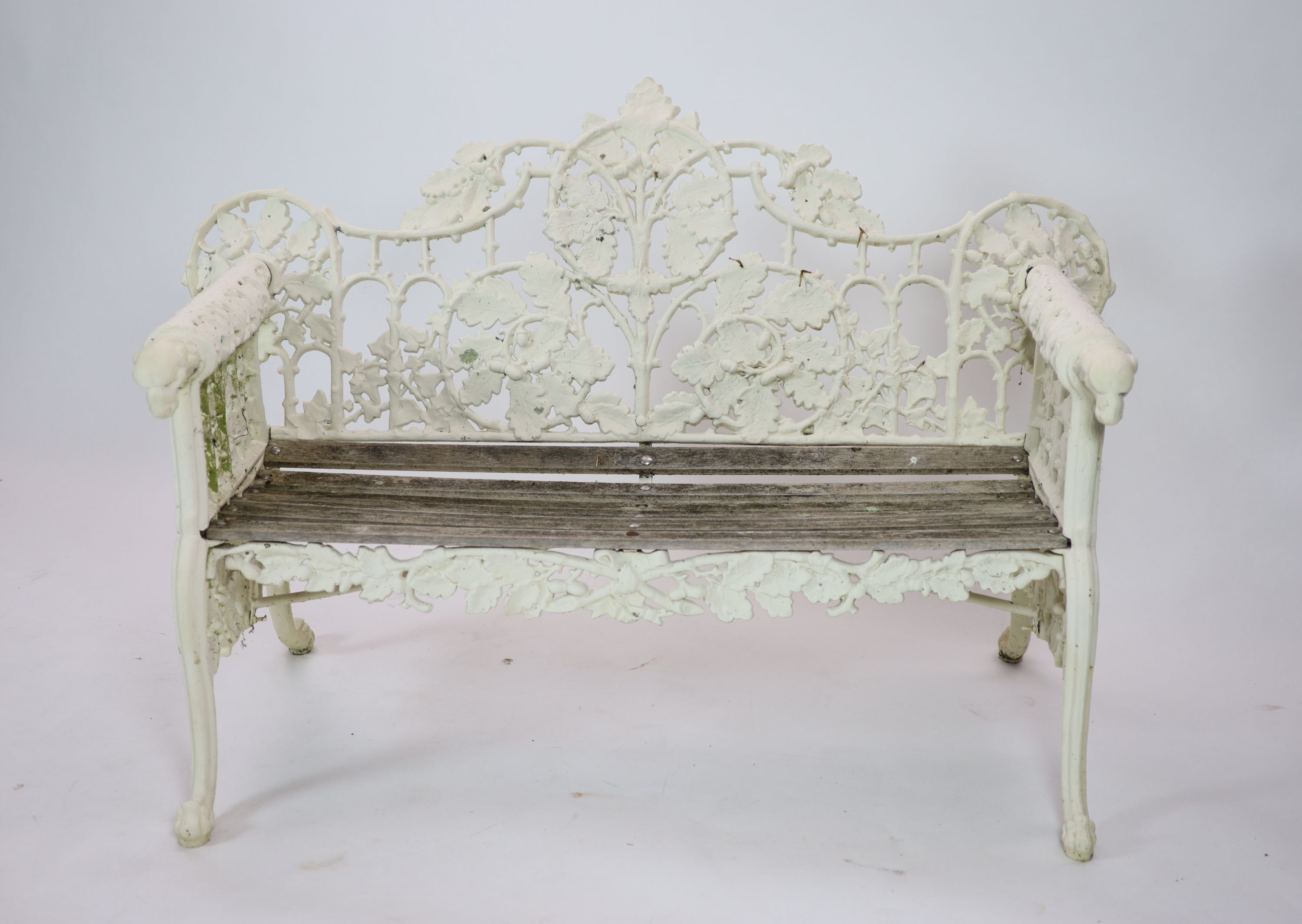After Coalbrookdale, a pair of cast iron ‘Oak and ivy' bencheswith white paintwork and teak - Image 4 of 4