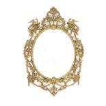 A 19th century Chippendale style gilt and gesso wall mirrorwith ornate foliate scroll frame capped