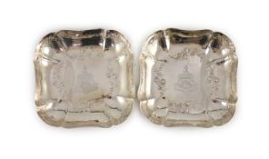 A pair of George III silver square shaped strawberry dishes, by John Mewburn,of shaped square