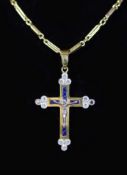 A modern 750 gold, sapphire and diamond set crucifix pendant, on a similar bar link chain,pendant