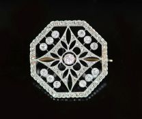A Belle Epoque platinum, round and rose cut diamond millegrain set octagonal open work brooch,