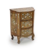 A mid 18th century North Italian marquetry inlaid walnut serpentine commode,decorated in bone with