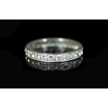 A platinum and diamond full eternity ring,set with twenty five round cut diamonds, size S, gross