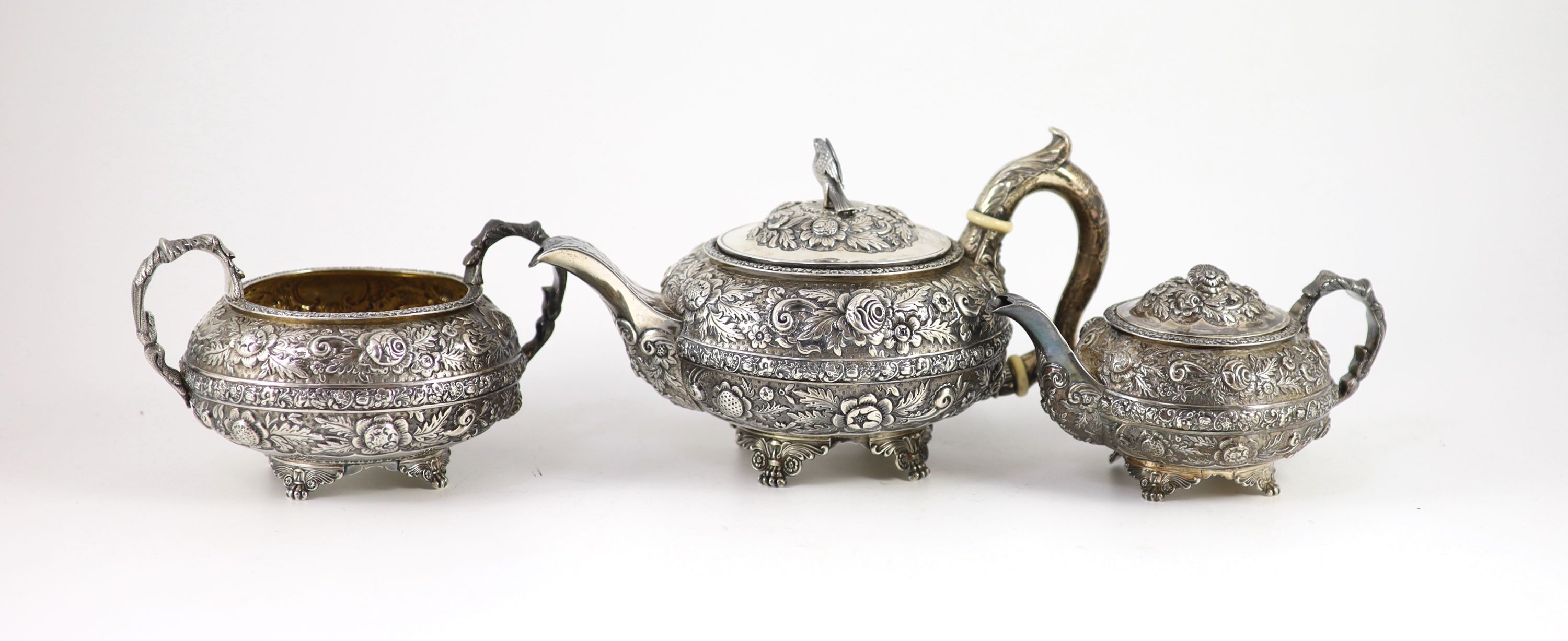 A late George III provincial silver three piece tea set by James Barber & William Whitwell,heavily - Image 2 of 4
