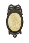 In the manner of Jurgen Kriebel (1580-1645), a relief carved ivory plaque of the Madonna and