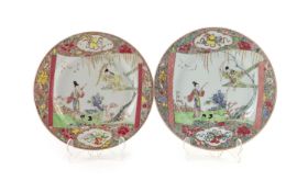 A near pair of Chinese famille rose plates, early Qianlong period,each depicting Zhang Sheng