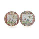 A near pair of Chinese famille rose plates, early Qianlong period,each depicting Zhang Sheng