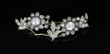 A late Victorian gold, silver and diamond cluster set foliate broochthe two largest diamonds