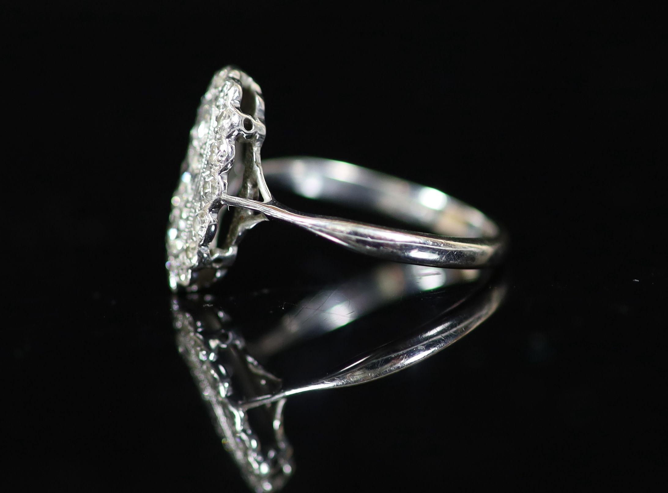 A 1940's 18ct white gold and diamond set oval cluster ring,size O/P, gross weight 3 grams. - Image 3 of 4