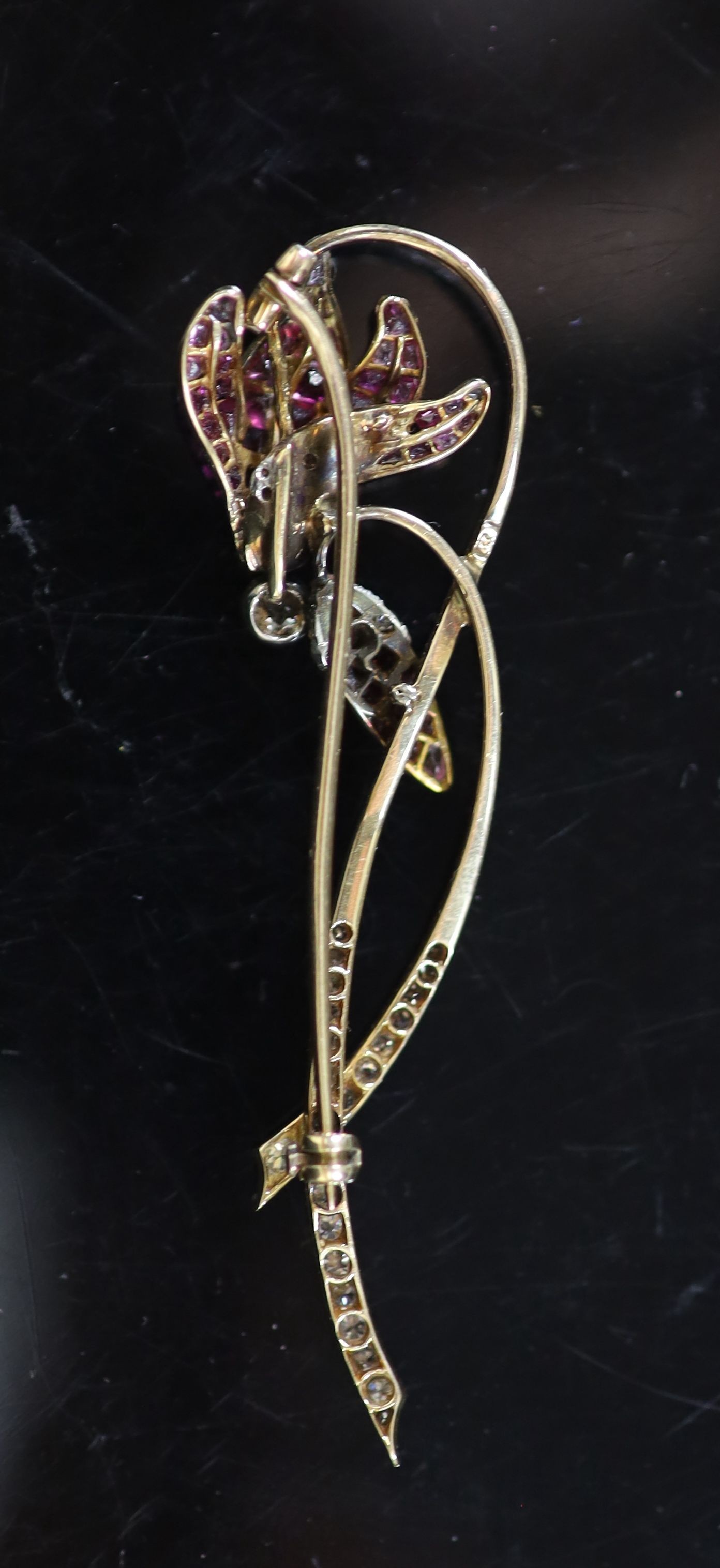 A mid 20th century, gold and platinum graduated ruby and diamond set foliate brooch, in gilt - Image 2 of 2