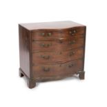 A George III mahogany caddy top serpentine chest,fitted four graduated long drawers flanked by