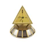 A 1960's Montre Royale de Geneva gilt bronze solar powered timepiece,with three triangular dials