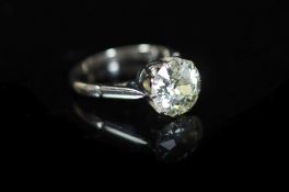 A platinum and solitaire diamond ring,the round cut stone weighing approximately in excess of 2.