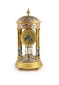 A late 19th century French ormolu and champleve enamel portico clock,the gilt arabic dial signed