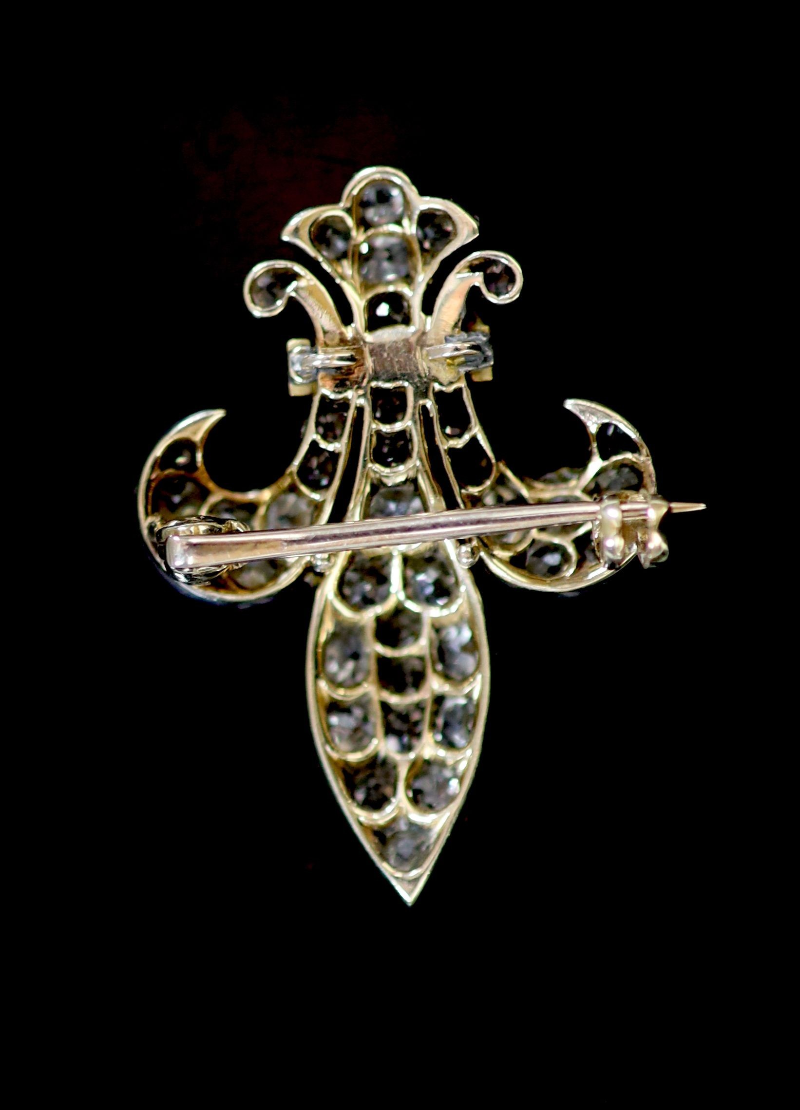 A Victorian gold and platinum, old mine cut diamond and garnet set Fleur de Lys brooch,29mm, gross - Image 3 of 3