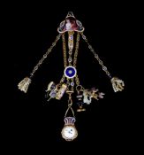An early 19th century French or Swiss gold and enamel chatelaine, hung with eleven assorted