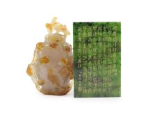 A Chinese agate vase and cover and a spinach green jade inscribed plaque, Qing dynasty and