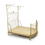 A Victorian R.W.Winfield & Co. brass half tester bed frame,With scroll embossed bow fronted foot