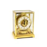 A Jaeger le Coultre gilt metal Atmos clock,with Arabic / baton numeral dial, movement number