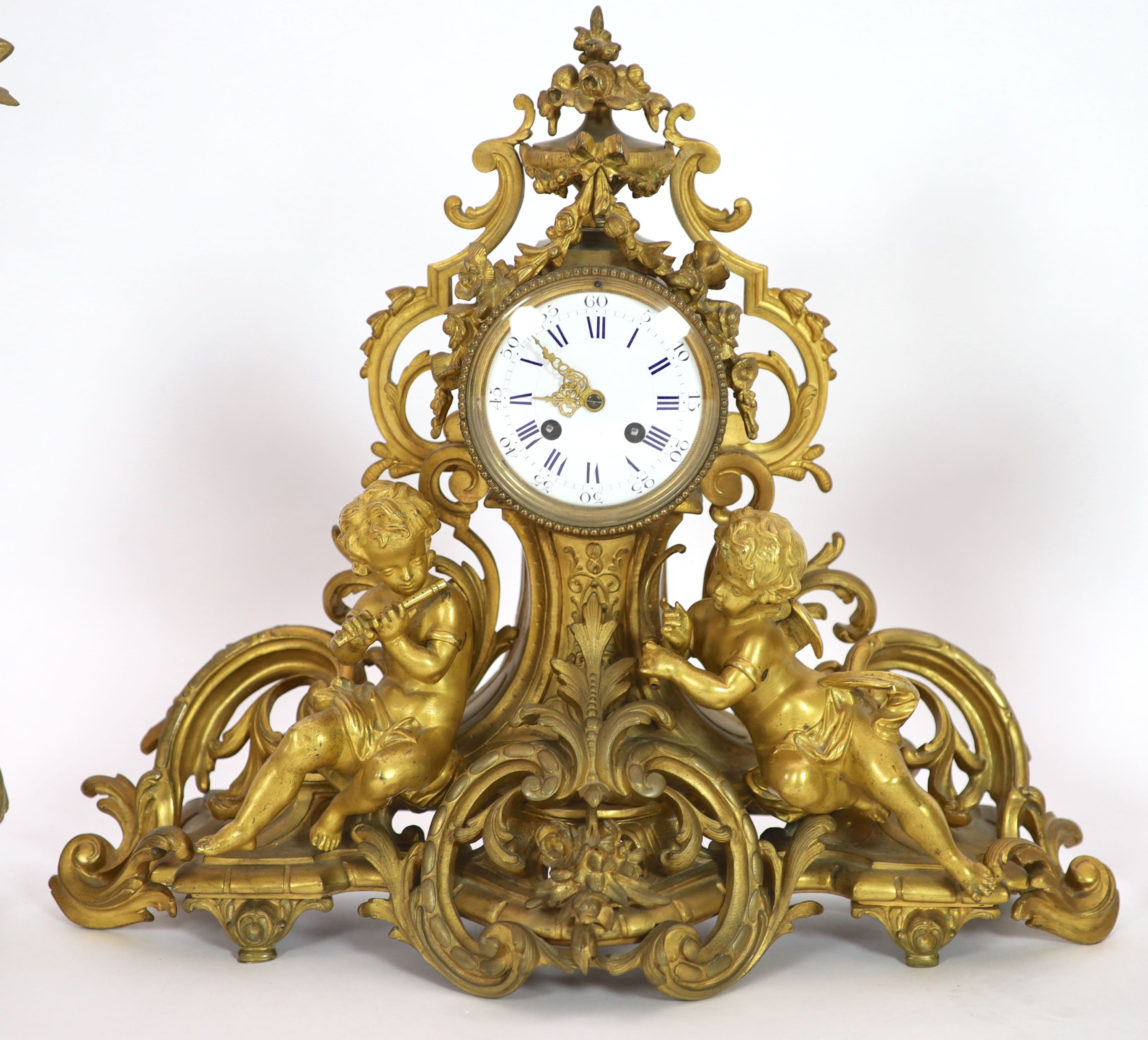 A 19th century Louis XV style ormolu clock garniture,the timepiece modelled with flowers and scrolls - Image 2 of 6