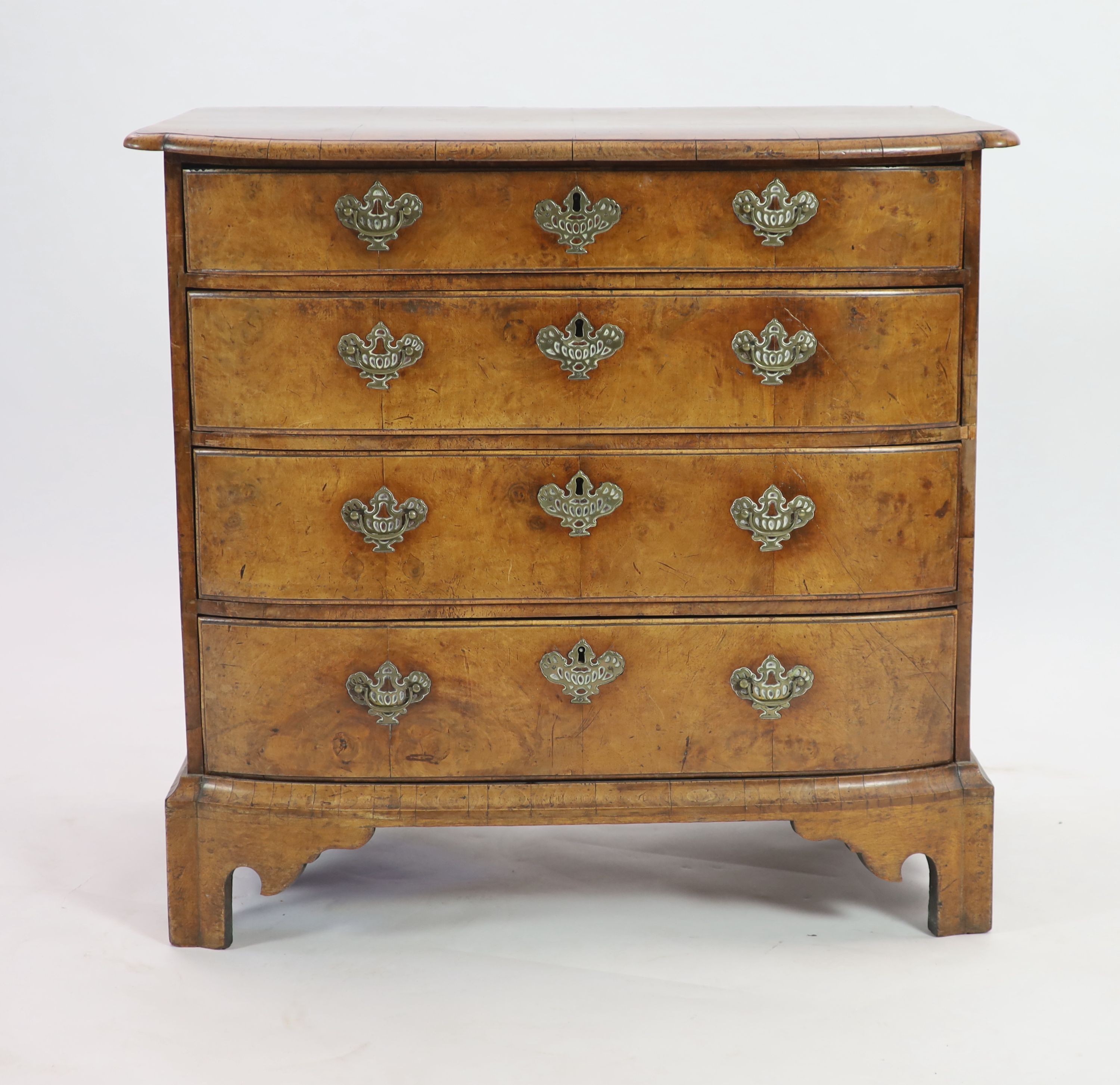 An 18th century Dutch walnut bowfront chestwith moulded top and four graduated long drawers, on - Image 2 of 4