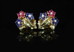 A pair of French Van Cleef & Arpels 18ct gold, ruby, diamond and sapphire set triple flower head