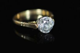 A gold and solitaire diamond ring,the round cut stone weighing approximately 2.00ct, size R/S, gross
