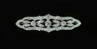 A mid 20th century pierced platinum and diamond cluster set brooch,of shaped oval form, 52mm,