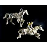 Two 9ct gold horse pendant charms including enamelled horse and jockey(a.f.), 33mm, gross 14.7