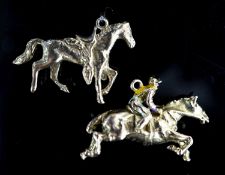 Two 9ct gold horse pendant charms including enamelled horse and jockey(a.f.), 33mm, gross 14.7