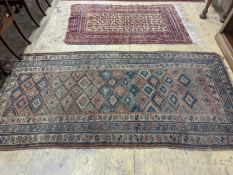 An antique Caucasian runner and a Belouch rug, larger 284 x 134cm