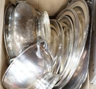 A quantity of plated wares including Mappin & Webb, platters, a two handled tray, bowls etc.