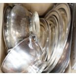 A quantity of plated wares including Mappin & Webb, platters, a two handled tray, bowls etc.
