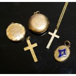 A group of small lockets and an 18ct cross pendant, 3.2 grams and a 15ct cross pendant, 3.6 grams.