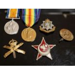 A WWI pair to 23125 PTE. H. ROFE E.SUR. R., together with an East Surrey Regiment cap badge, two