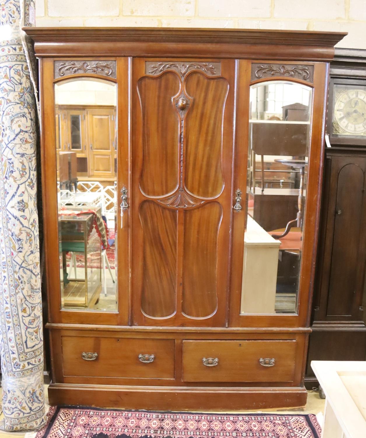 A late Victorian mahogany mirrored wardrobe, length 160cm, depth 54cm, height 210cm