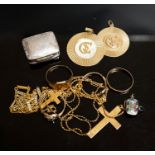 A group of mixed yellow metal items including two 14k pendants and a 14k band, 11.5 grams, two 9ct