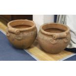 A pair of Compton terracotta garden urns, diameter 36cm, height 30cm