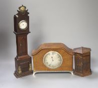 A late Georgian miniature longcase clock with pocket watch dial, puzzle coin box and mantel clock