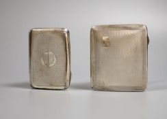 Two engine turned silver cigarette cases, including late Victorian, largest 86mm.