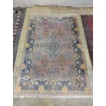 A North West Persian design peach ground carpet, 250 x 170cm